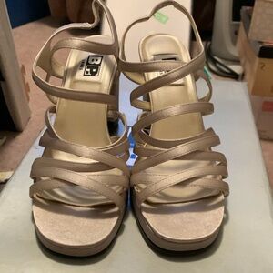 Strappy silver heels